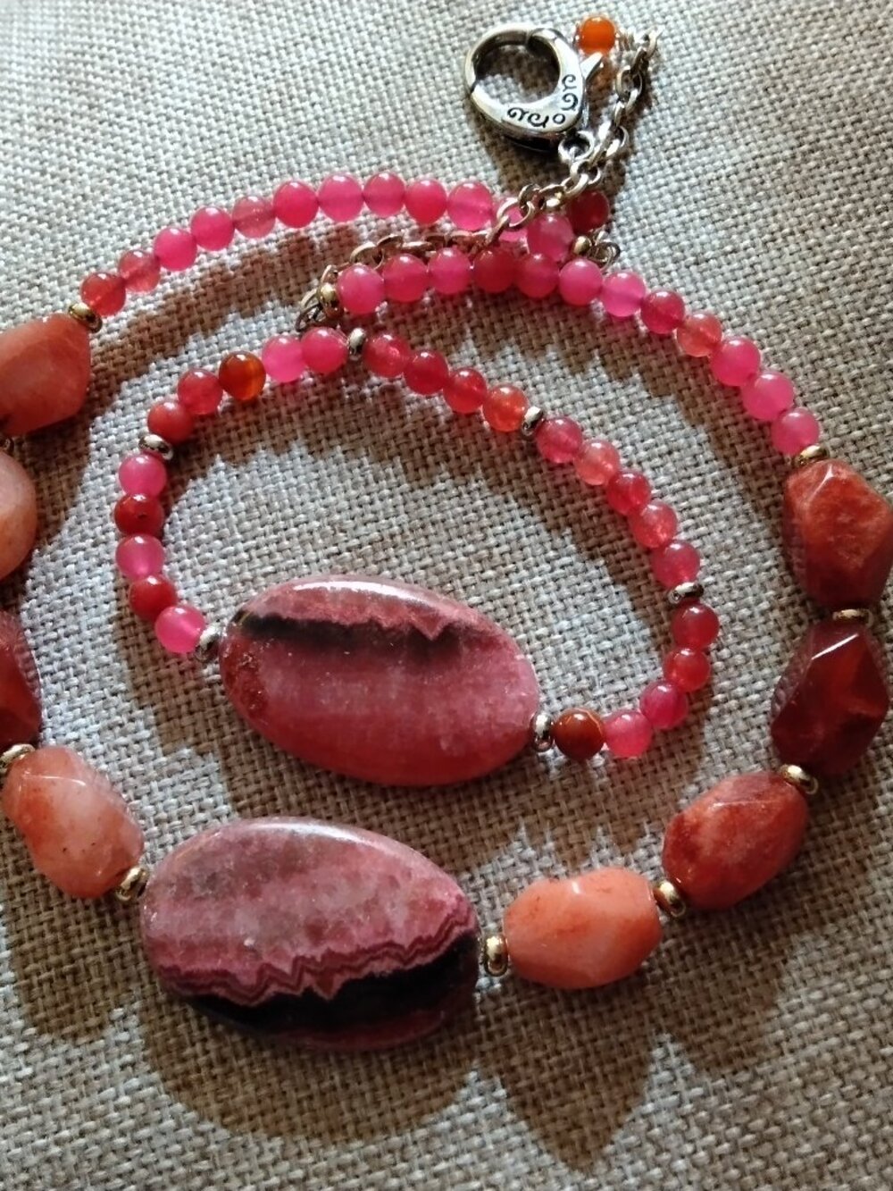 Rhodochrosite and carnelian necklace and stretch bracelet set.